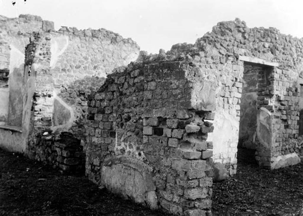230883 Bestand-D-DAI-ROM-W.735.jpg
VI.9.5 Pompeii. W735. Looking across south-east corner of Corinthian atrium. On the left can be seen the window sill of room 25, with doorway to room 24 (centre left). On the right is the open entrance to pseudo-peristyle 19, with doorway to corridor 23 in its east wall (extreme right).
Photo by Tatiana Warscher. With kind permission of DAI Rome, whose copyright it remains.
See http://arachne.uni-koeln.de/item/marbilderbestand/230883