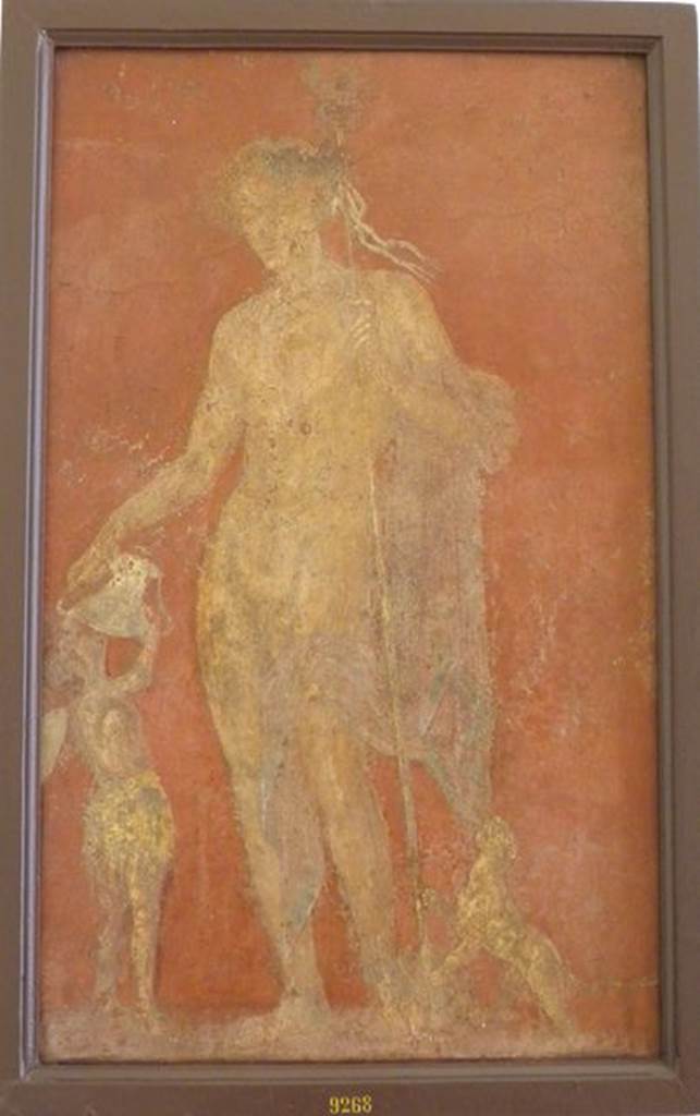 VI.9.6 Pompeii. Found on 1st July 1828. Wall painting of Dionysus or Bacchus with panther to his left and a Cantharus in his right hand from which a satyr is drinking. One of various painted figures found on the walls of the atrium. See Helbig, W., 1868. Wandgemälde der vom Vesuv verschütteten Städte Campaniens. Leipzig: Breitkopf und Härtel. (400). Now in Naples Archaeological Museum. Inventory number 9268.