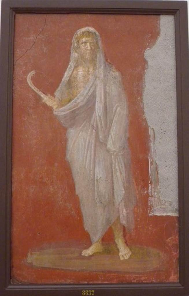 VI.9.6 Pompeii. Found on 18th June 1828. Room 4. Area leading to peristyle. Wall painting of Saturn or Chronos or Chronus holding a sickle. One of two paintings that flanked the door in the deep bay that formed a vestibule for the peristyle. Now in Naples Archaeological Museum. Inventory number 8837. See Helbig, W., 1868. Wandgemälde der vom Vesuv verschütteten Städte Campaniens. Leipzig: Breitkopf und Härtel. (96).