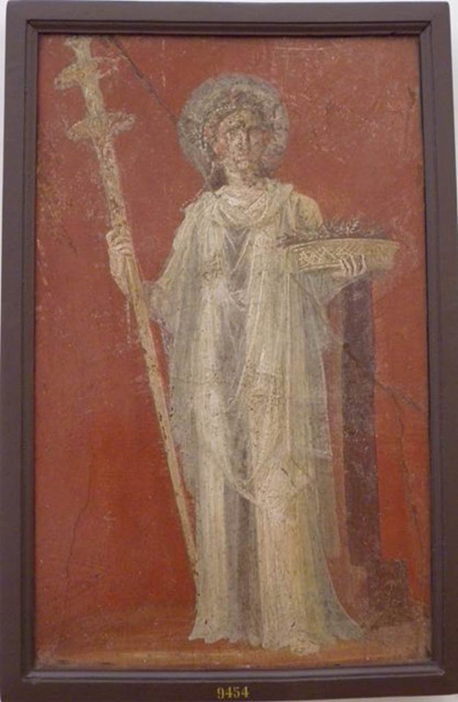 VI.9.6 Pompeii. Found on 18th June 1828. Room 4. Area leading to peristyle. Wall painting of Ceres holding a long torch and a basket full of ears of grain. One of two paintings that flanked the door in the deep bay that formed a vestibule for the peristyle. Now in Naples Archaeological Museum. Inventory number 9454.
