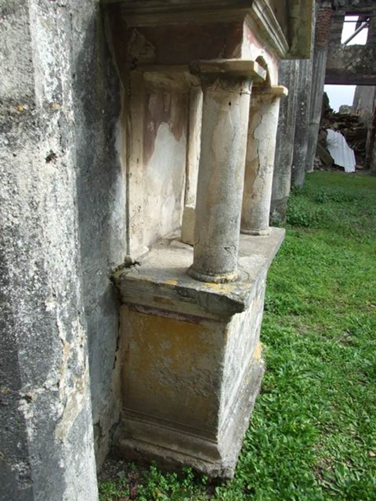 VI.9.6 Pompeii. March 2009. Room 17, north side of aedicula lararium against east wall of garden area.