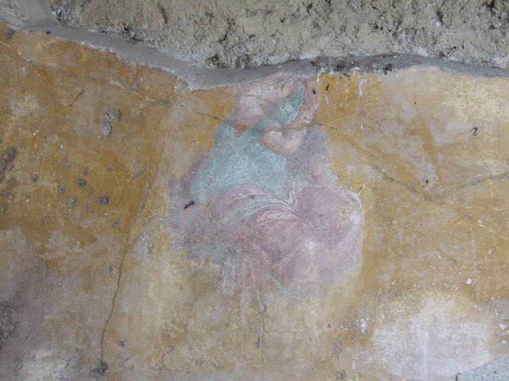 VI.9.6 Pompeii. March 2009. Room 6, wall painting of a sitting girl in green chiton and red mantel. From the south end of the west wall of the peristyle.
See Helbig, W., 1868. Wandgemälde der vom Vesuv verschütteten Städte Campaniens. Leipzig: Breitkopf und Härtel. (1886: p.438).