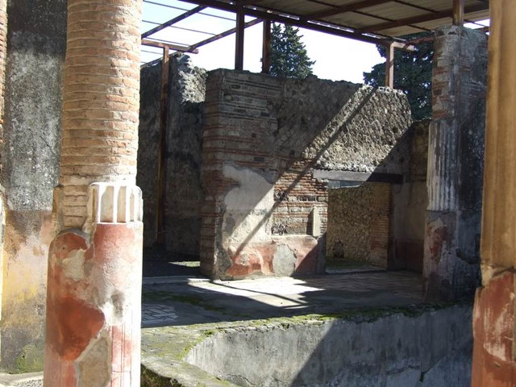 VI.9.6 Pompeii. March 2009. Room 6, east end of peristyle with two pilasters and east wall, with doorways to rooms 22 and 24.