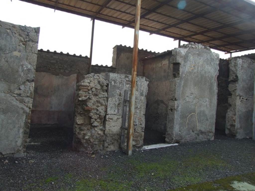 VI.9.7 Pompeii. March 2009. Doorways to room 8, room 7 and room 6, three rooms on south side of atrium.