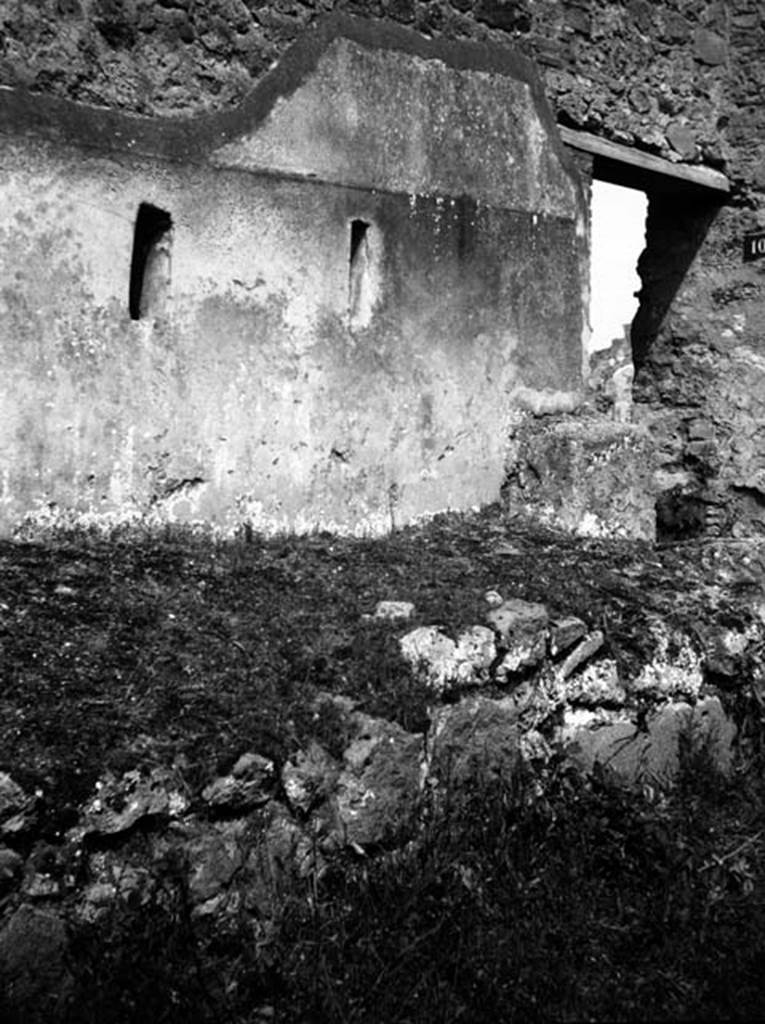 231331 Bestand-D-DAI-ROM-W.0943A.jpg
6.9.9 rear wall with two windows from latrine, and 6.9.10, Pompeii. W943A. Façade on Vicolo del Fauno, on south side of doorway 10. Looking north.
Photo by Tatiana Warscher. With kind permission of DAI Rome, whose copyright it remains.
See http://arachne.uni-koeln.de/item/marbilderbestand/231331