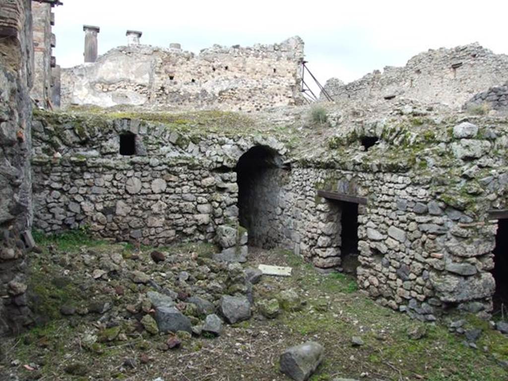 VI.9.10 Pompeii. March 2009. Kitchen area underneath rear of house. Note the columns used in building the wall.