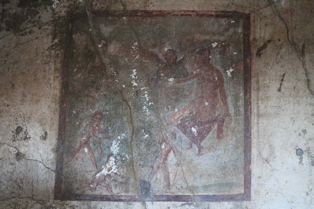 VI.10.1 Pompeii. December 2018.
Central wall painting from north wall of rear room showing Venus Pescatrice with three cupids and angel. Photo courtesy of Aude Durand.