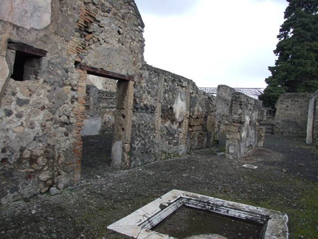 VI.10.2 Pompeii. March 2009. Doorway to oecus, on north side of atrium.