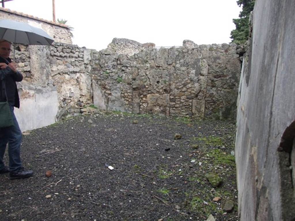 VI.10.2 Pompeii. March 2009. Oecus on north side of atrium, looking east. According to Bragantini, the north wall of this room would have been decorated with a black dado. The middle zone of the walls was colourless but would have been panelled and with narrow compartments. The decoration on the south wall was completely illegible.
See Bragantini, de Vos, Badoni, 1983. Pitture e Pavimenti di Pompei, Parte 2. Rome: ICCD. (p.231, oecus 6)