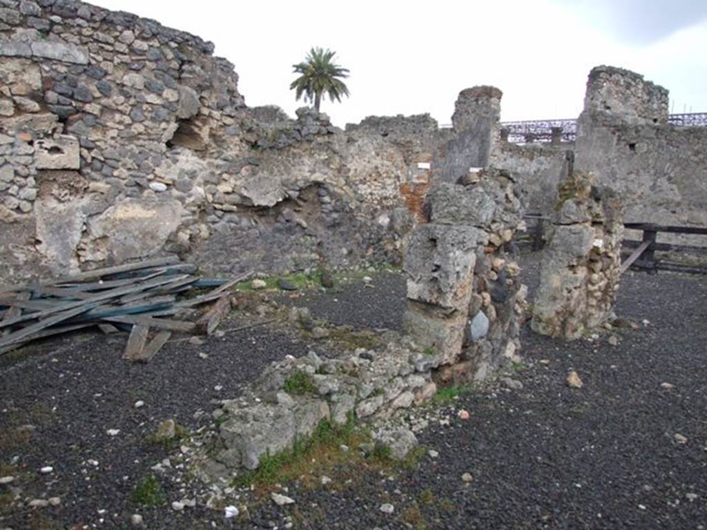 VI.10.2 Pompeii. March 2009. Remains of rooms in north-east corner, destroyed by bombing in 1943.
According to Helbig, paintings found in the second room on the left of the peristyle (roughly to the left of where all the wood is piled) were –
on the left (west) wall was a painting of a Warrior asking the Oracle, (no longer there), Helbig 1391
on the right (east) wall was a painting of Perseus and Andromeda, Helbig 1187. MN 8993.
See Helbig, W., 1868. Wandgemälde der vom Vesuv verschütteten Städte Campaniens. Leipzig: Breitkopf und Härtel. (1187, 1391).