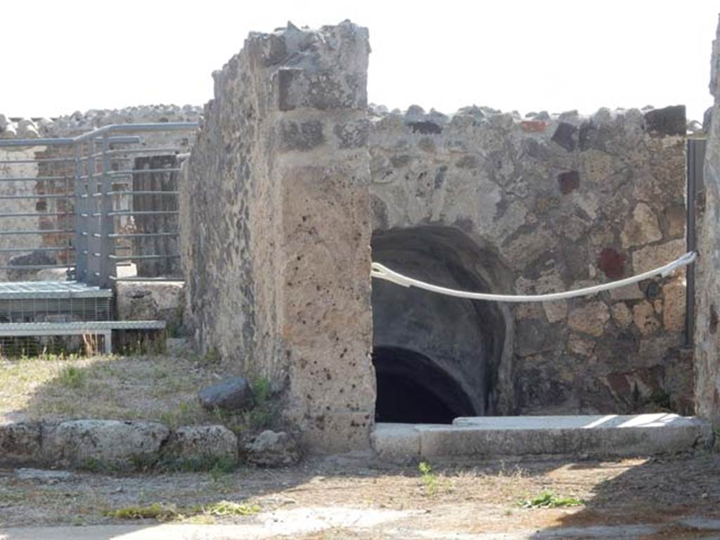 VI.10.7 Pompeii. May 2017.
Looking east across atrium towards south side of tablinum, on left, and stairs to lower level, on right. Photo courtesy of Buzz Ferebee.