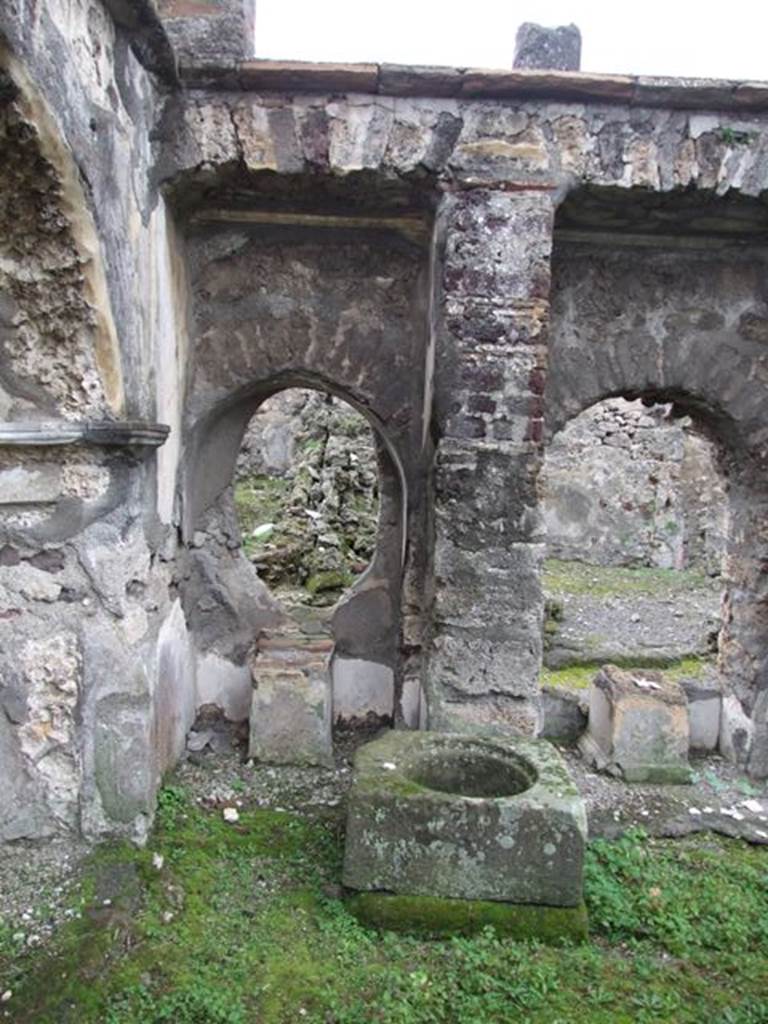 VI.10.7 Pompeii. March 2009. Room 15. Garden area. West side. Arched recess 9 and cistern mouth at south end.