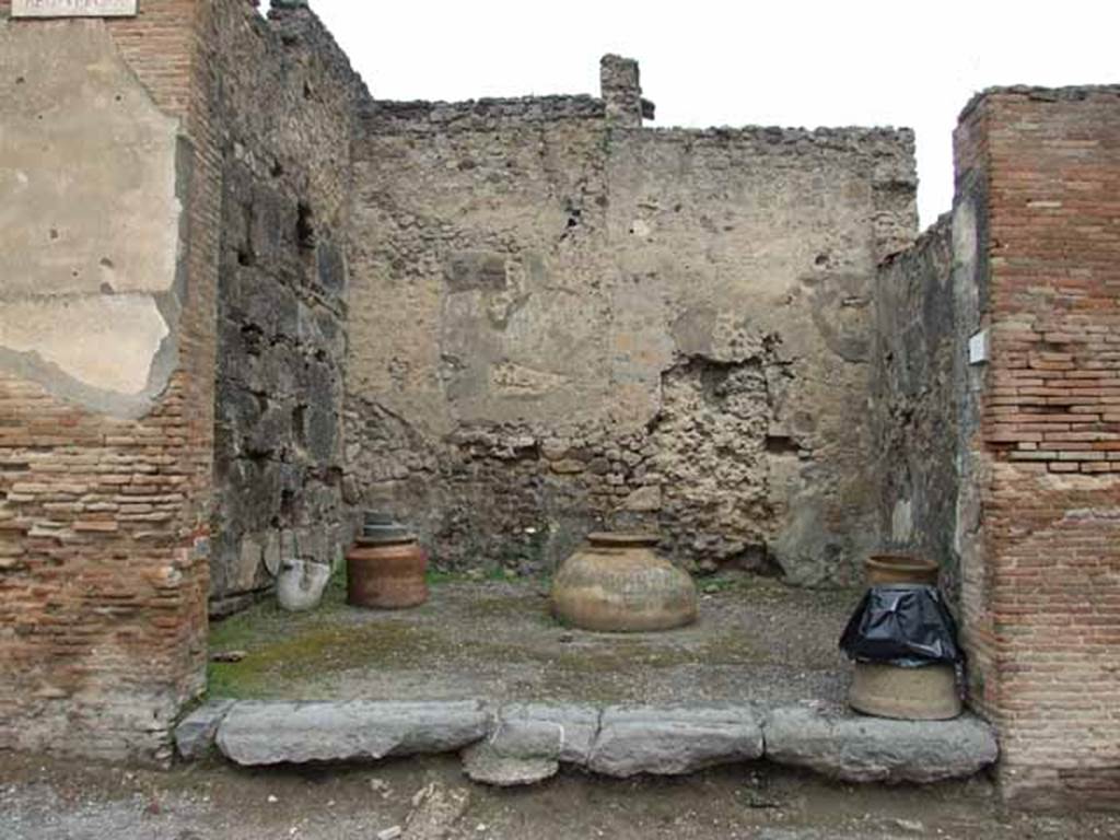 VI.10.10 Pompeii. May 2010. Looking north. According to Frohlich, found in the upper zone on the pilaster to the left was a painting of a male figure. In the lower zone on the left was a painting of a ship with rowers. A painting of a figure, possibly a Lar, was seen on the right pilaster, between VI.10.10 and VI.10.11. Below were two serpents flanking an altar. All the paintings have now faded and disappeared.
See Fröhlich, T., 1991. Lararien und Fassadenbilder in den Vesuvstädten. Mainz: von Zabern. (F40)
See Helbig, W., 1868. Wandgemälde der vom Vesuv verschütteten Städte Campaniens. Leipzig: Breitkopf und Härtel. (86 and 87)