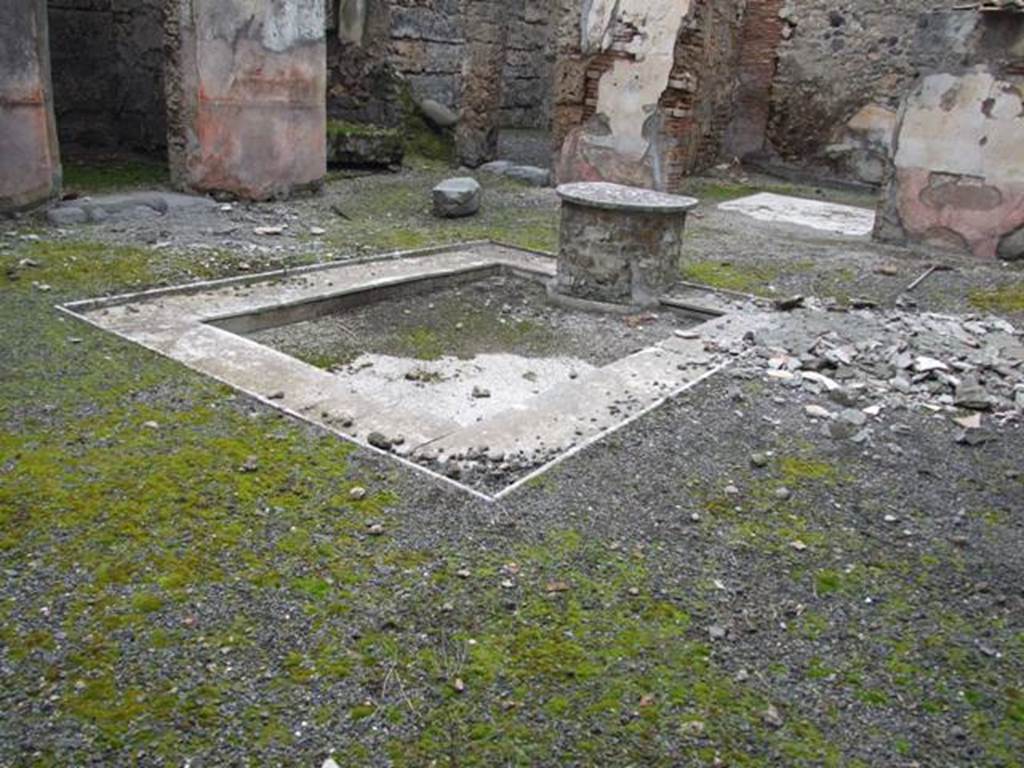 VI.10.11 Pompeii. March 2009. Room 3, mosaic impluvium with marble sides and remains of mosaic puteal which supported a table. According to Breton, the puteal was found with a mosaic representing a river god, a head of Jupiter, griffins, masks, and other subjects, of which not a lot remained.
See Breton, Ernest. 1870. Pompeia, Guide de visite a Pompei, 3rd ed. Paris, Guerin.