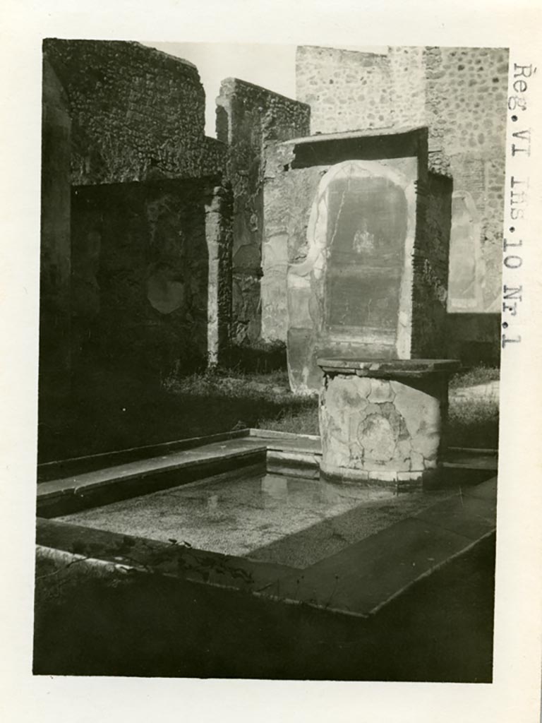 VI.10.11 Pompeii but shown as from VI.10.1 on the photo. Pre-1937-39.
Looking north-west across atrium towards the wall between rooms 9 and 8, still showing the painting of Zeus.
Photo courtesy of American Academy in Rome, Photographic Archive. Warsher collection no. 1831.