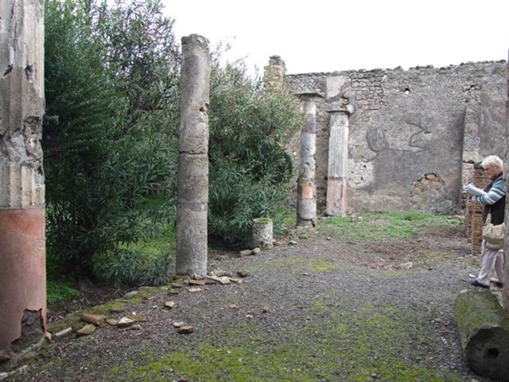 VI.10.11 Pompeii. March 2009. Room 17, looking east along south portico of garden.
According to Jashemski, the garden had a portico on the south supported by two pillars and four columns. It was joined by a low wall with a space for planting in the top. In the centre of the garden, there are the remains of the masonry summer triclinium. In the centre of the triclinium, the base for the table still remains.
See Jashemski, W. F., 1993. The Gardens of Pompeii, Volume II: Appendices. New York: Caratzas. (p.141-2)