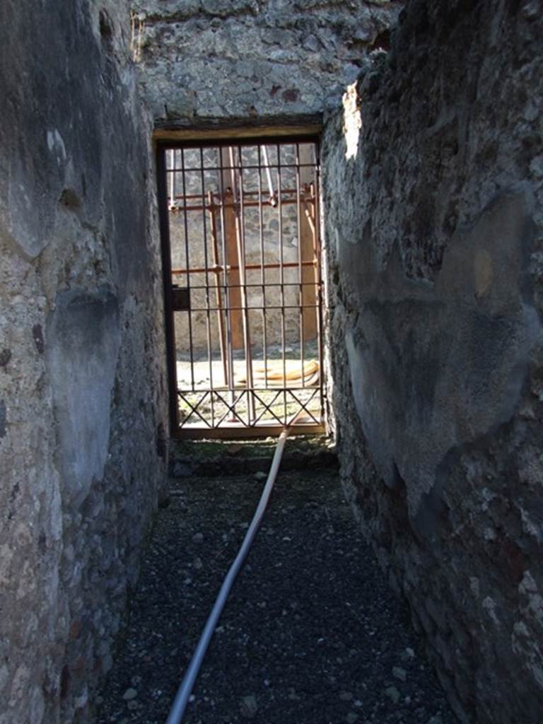 VI.11.8 Pompeii. December 2007. Entrance doorway 51 from inside, looking west.