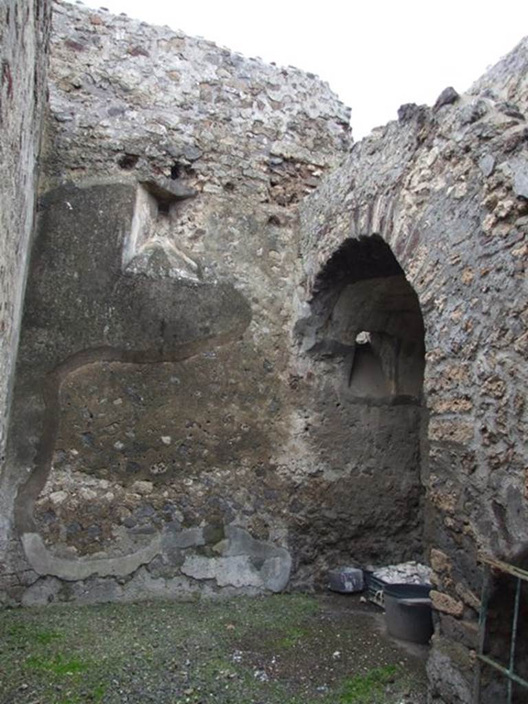 VI.11.9 Pompeii. March 2009. Room 8, west wall, with arched recess under stairs on north wall.