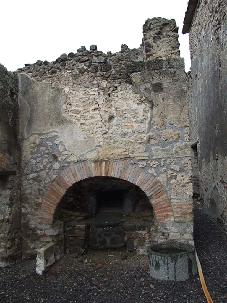 VI.11.9 Pompeii. December 2006. Room 16, oven 55 in small bakery with corridor 57 to the side.
Corridor 57 on right leads to small house (VI.11.8) possibly used as lodgings for the manager.
