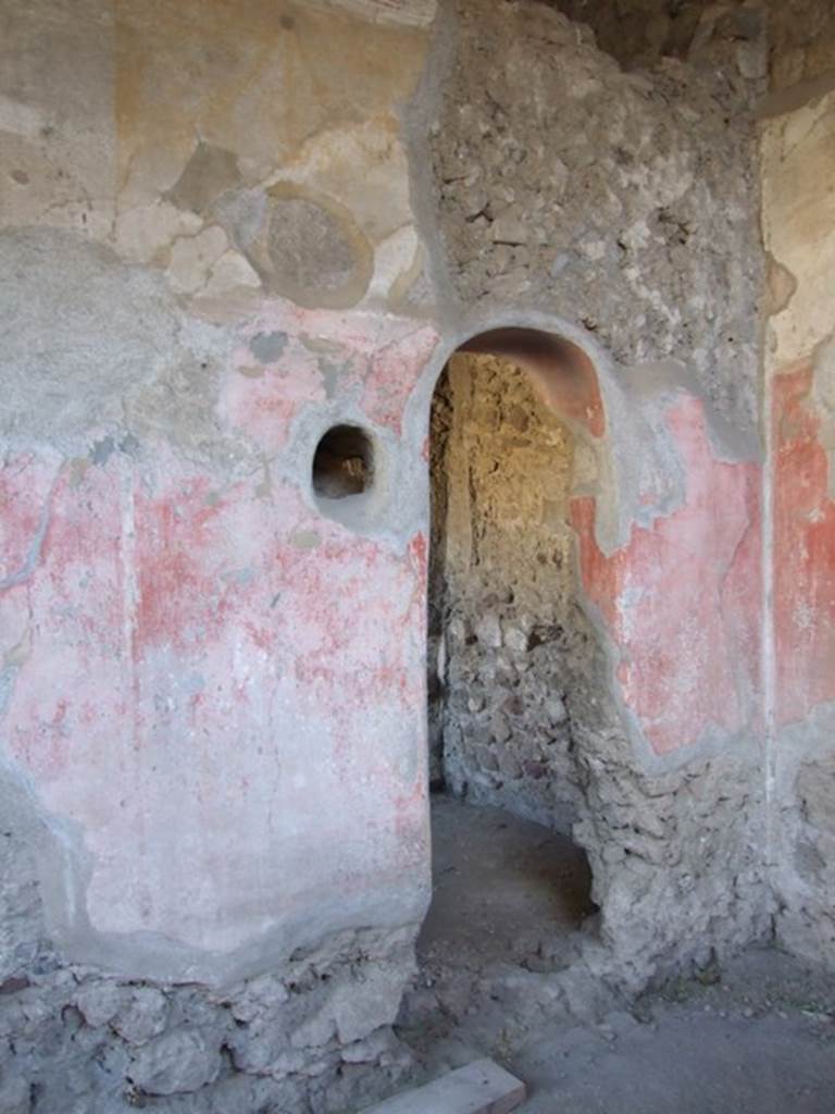 VI.11.9 Pompeii. December 2007. Room 20, east wall with doorway into room 59.