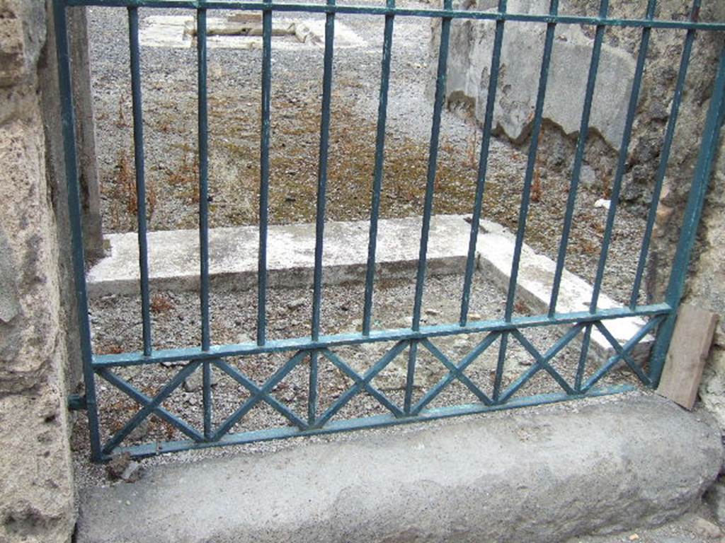 VI.11.9Pompeii. Detail of entrance step