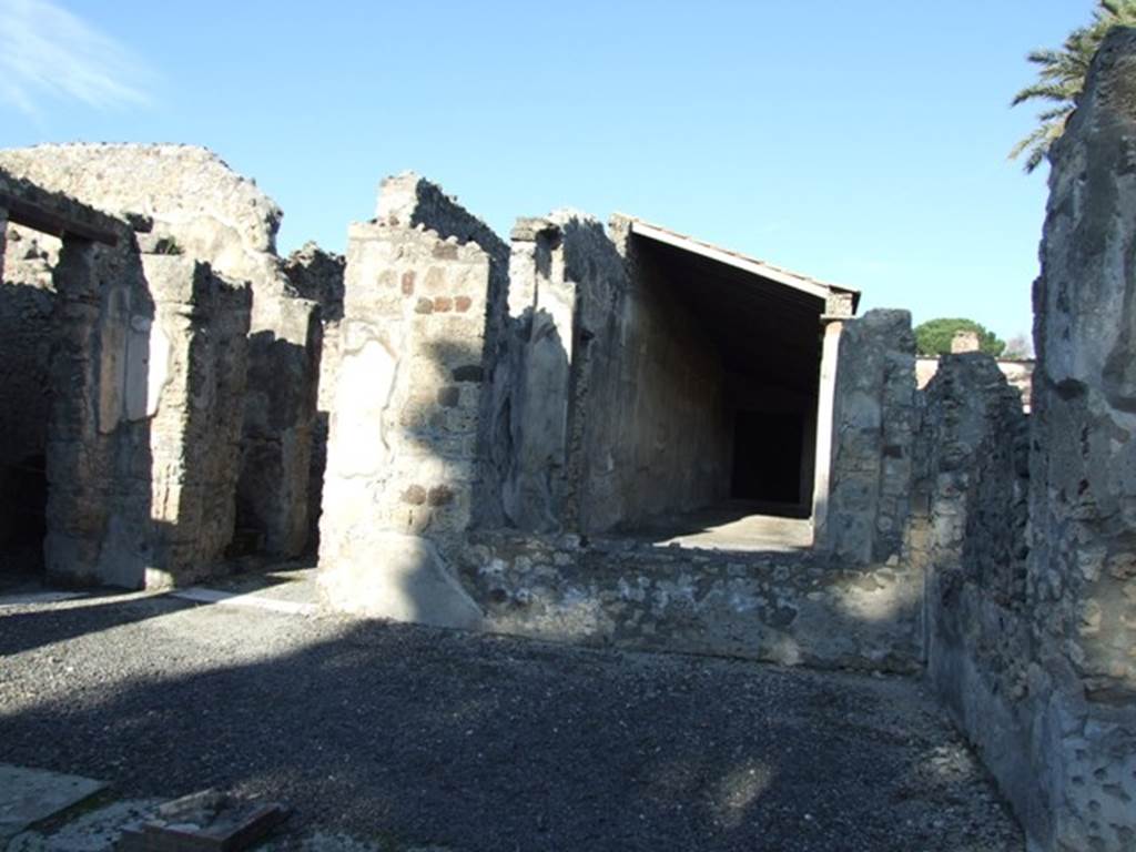 VI.11.9 Pompeii. December 2007.
Room 3, north-east corner of atrium, looking north into peristyle area across window of room 38.
