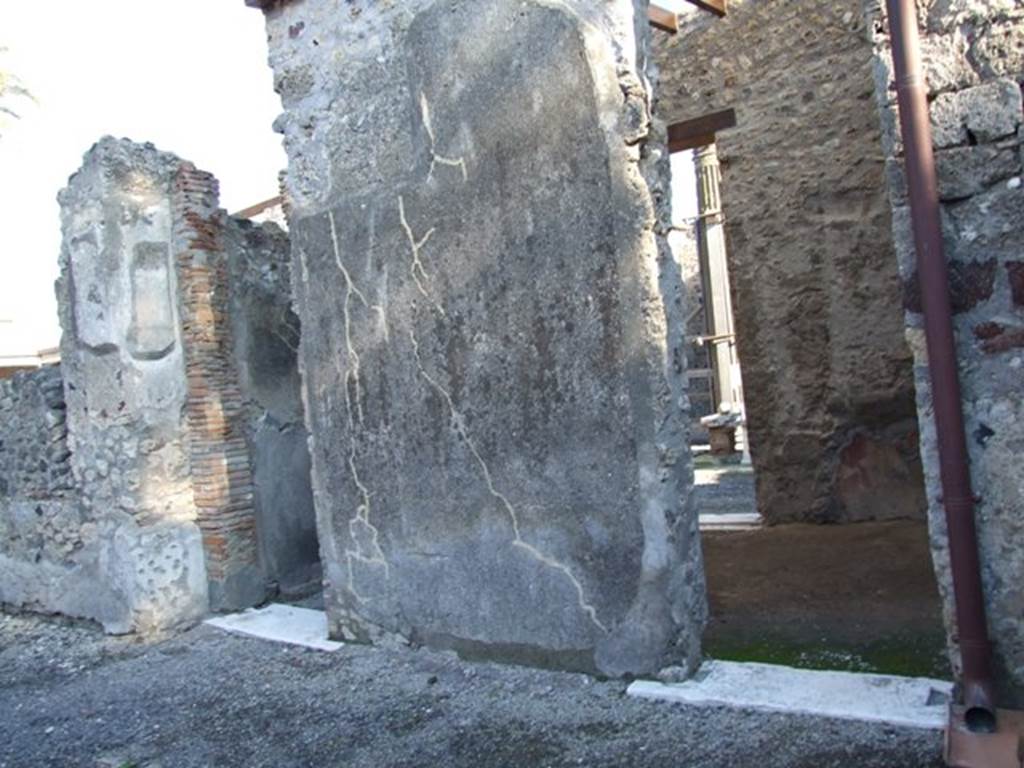 VI.11.9 Pompeii. December 2007. Room 3, atrium, east side.
Looking east through rear doorway of room 29, into Tetrastyle atrium of VI.11.10.
On the left is the doorway to corridor 48, also linking to atrium of VI.11.10.