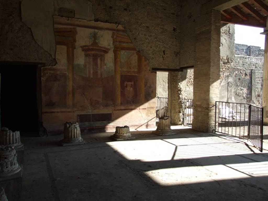 VI.11.10 Pompeii. December 2007. Room 43, looking east towards wall with architectural wall painting.
Doorway to room 45 is at the left end, and doorway to room 46 at the right end.
