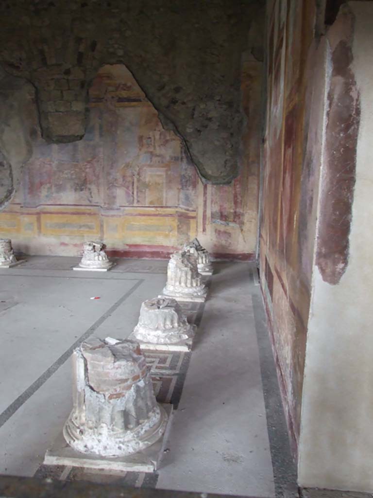 VI.11.10 Pompeii. December 2006.
Room 43, looking north along “corridor” behind remains of columns, on east side.