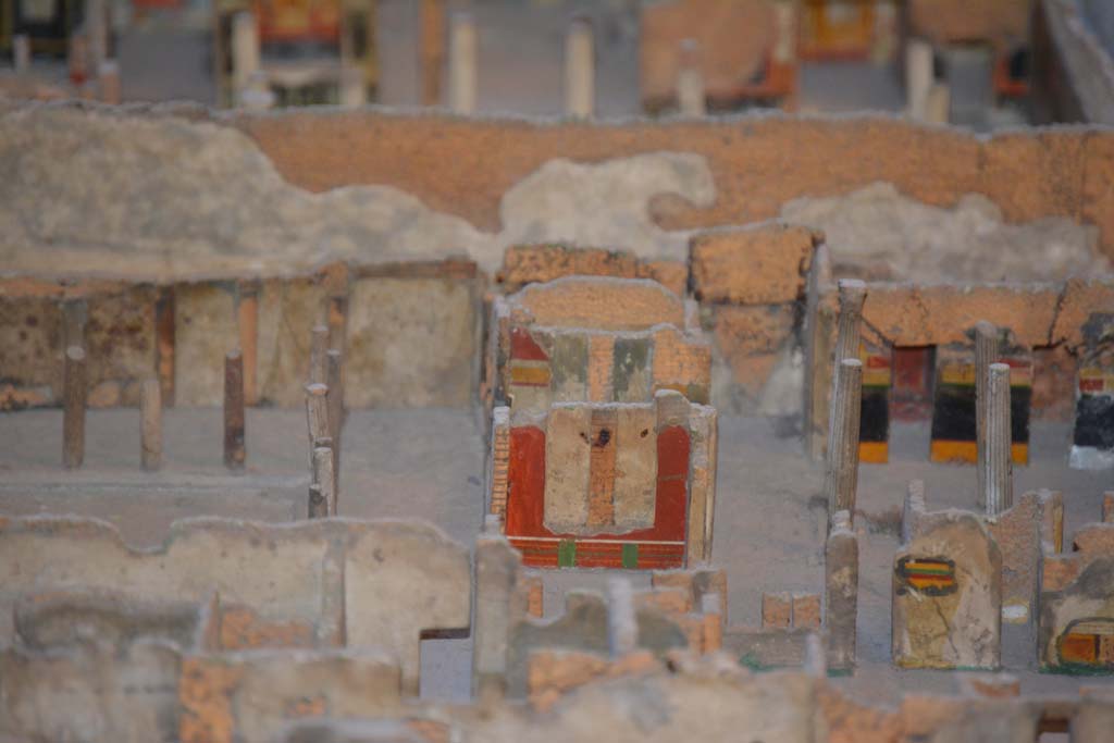 VI.11.9/10 Pompeii. July 2017. Looking east towards red painted east wall of room 35, in centre.
At the rear of this room, the east wall of tablinum 33 can be seen.
From cork model in Naples Archaeological Museum.
Foto Annette Haug, ERC Grant 681269 DÉCOR.