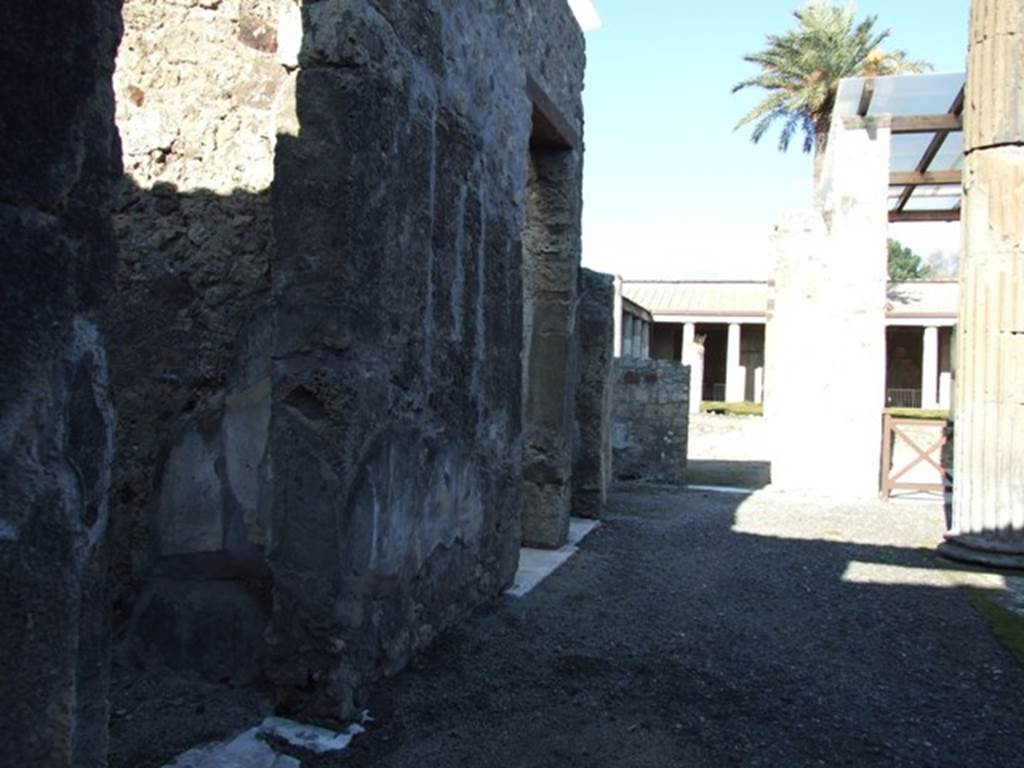 VI.11.10 Pompeii. December 2007. Looking north along west side of atrium.