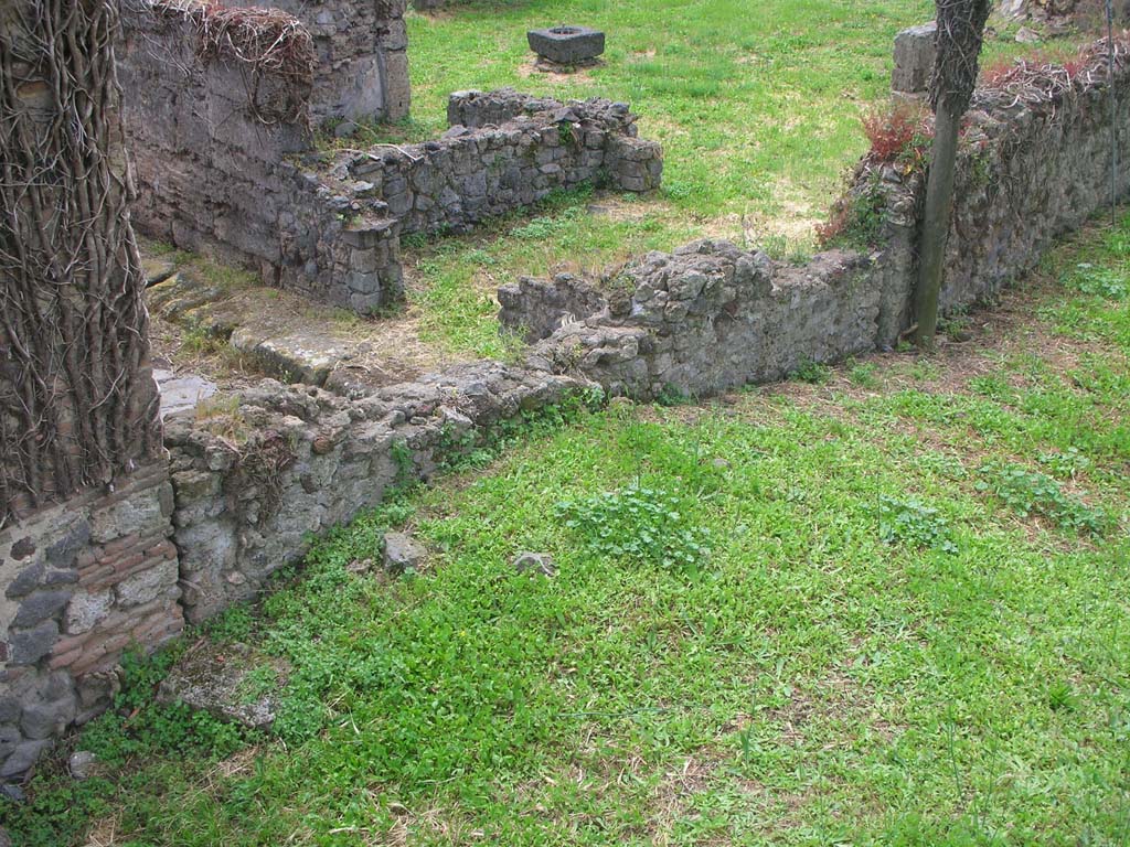 VI.11.20 Pompeii, Pompeii. May 2010.
Looking towards entrance doorway on west side of Vicolo del Labirinto, from Tower X. Photo courtesy of Ivo van der Graaff.