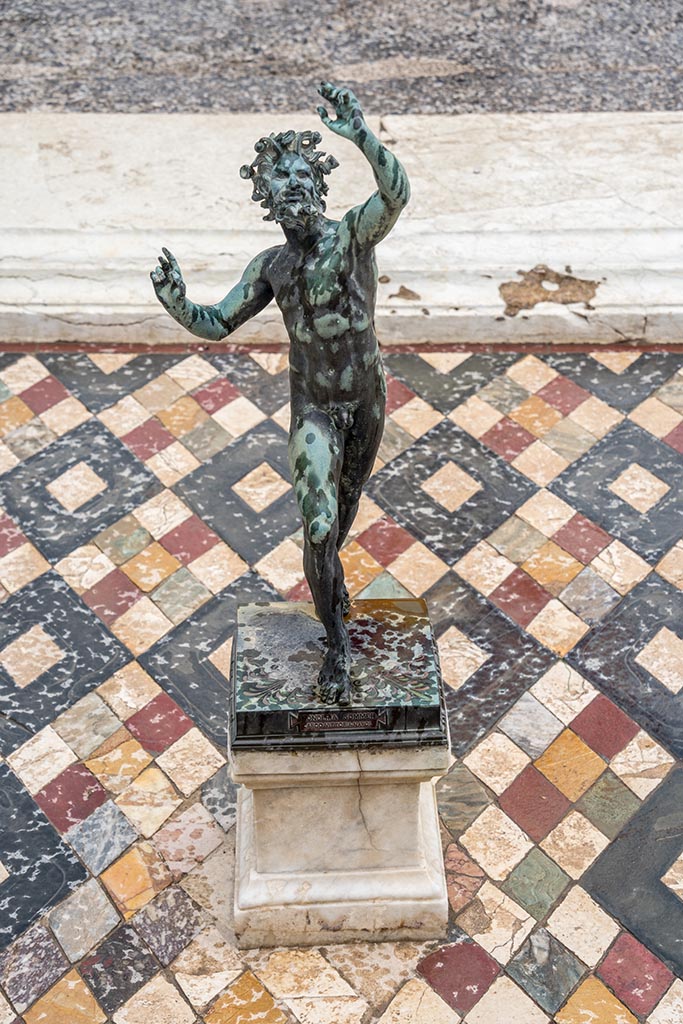 VI.12.2 Pompeii. July 2024.
Looking north across impluvium with dancing faun. Photo courtesy of Johannes Eber.