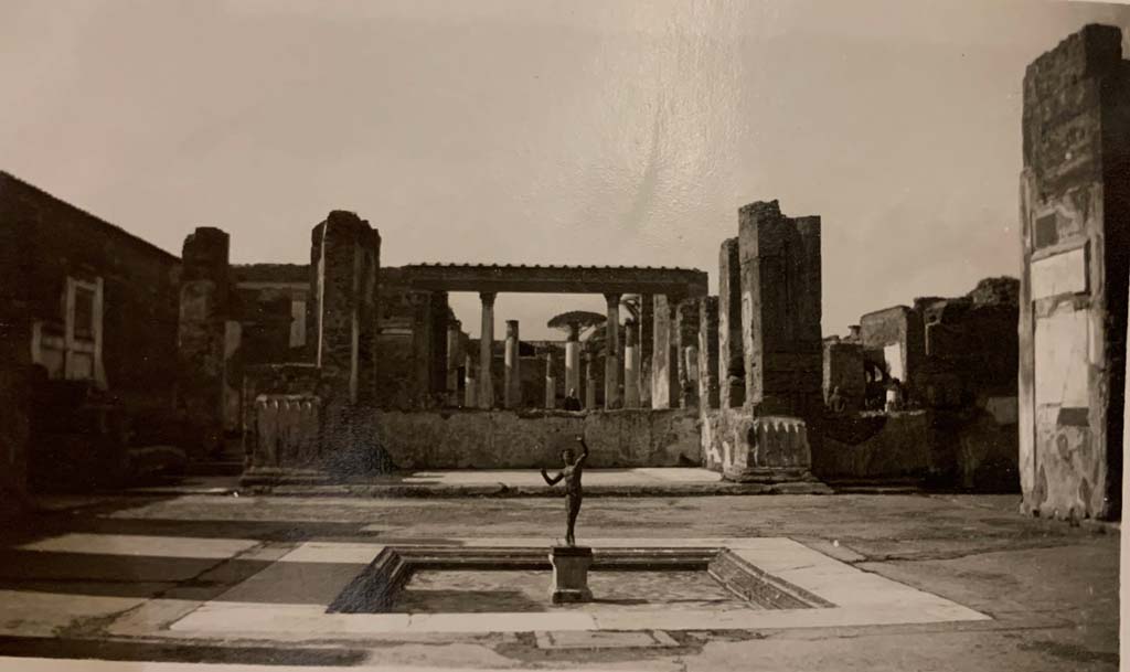 VI.12.2 Pompeii. May 1934, from an album of the Nierhoff family vacation. Looking across impluvium in atrium.
Photo courtesy of Rick Bauer.
