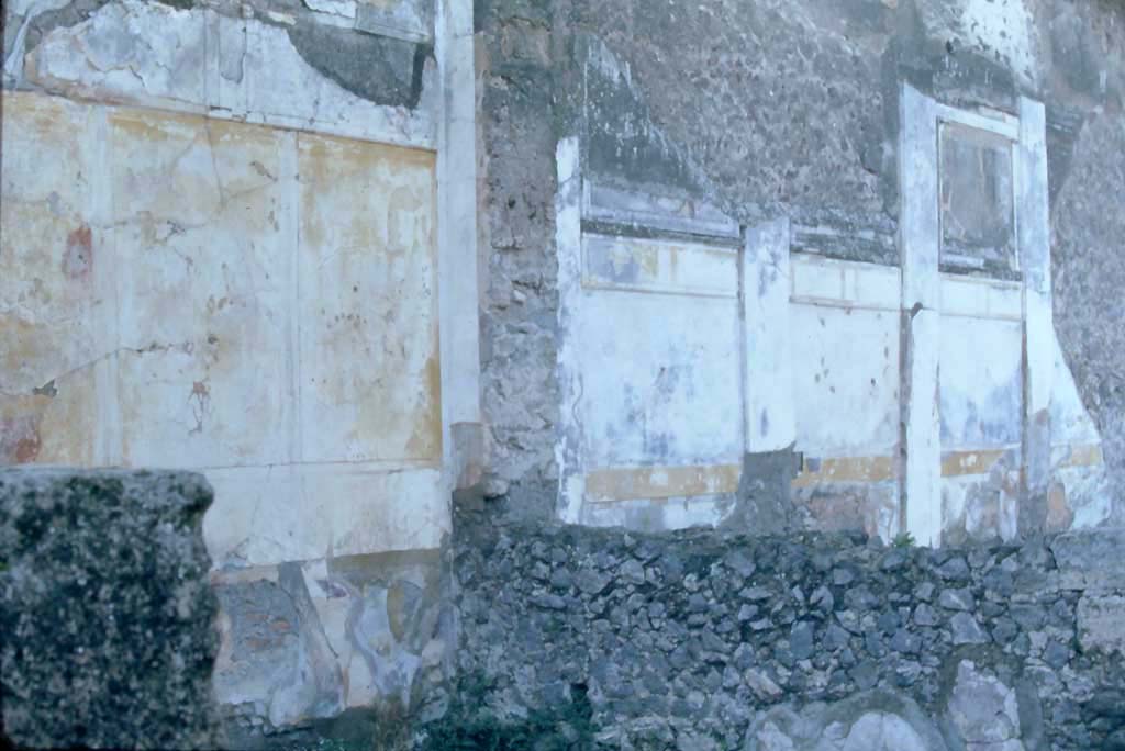 VI.12.2 Pompeii. 4th December 1971.
Looking towards west wall in north-west corner of triclinium/dining room 35 on west side of tablinum, on the left.
On the right is the west wall in the south-west corner of the middle peristyle/garden.
Photo courtesy of Rick Bauer, from Dr George Fay’s slides collection.