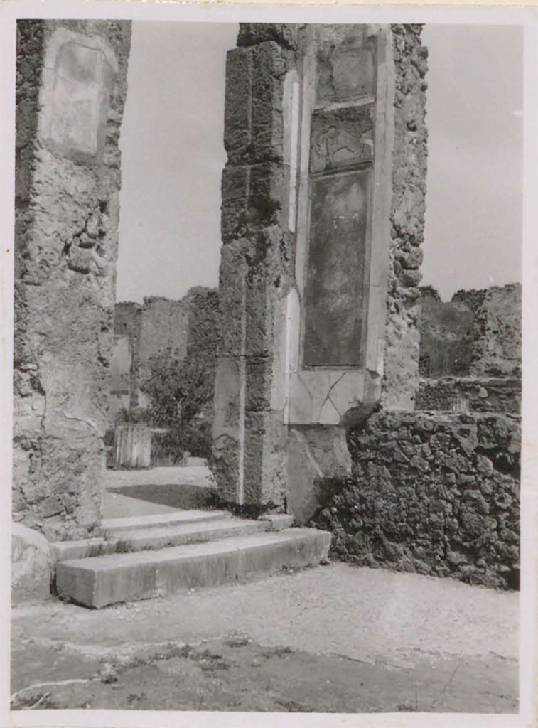 VI.12.2 Pompeii. Pre-1943.
Looking towards north-east corner of triclinium/dining room 35, with doorway and step to middle peristyle/garden.
See Warscher, T. (1946). Casa del Fauno, Swedish Institute, Rome. (p.28, n.38).