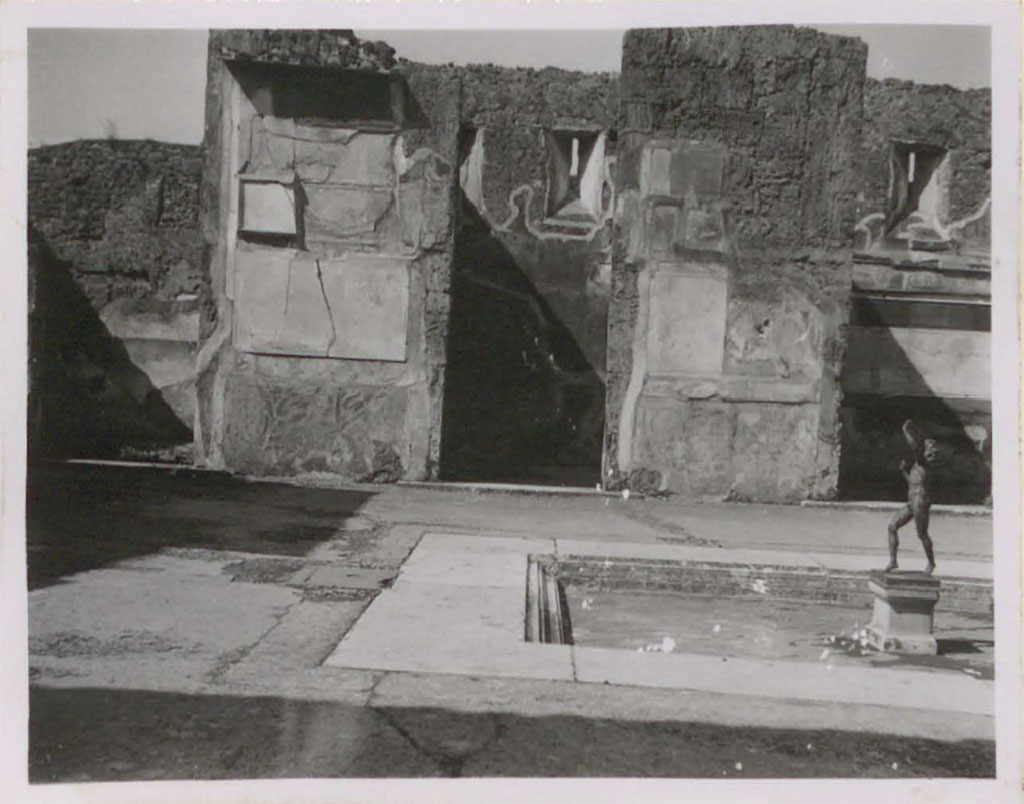 VI.12.2 Pompeii. Pre-1943. Looking across Tuscan atrium towards three doorways on west side of atrium.
The room 5 in south-west corner is on the left. The second room 31 is in the centre.
See Warscher, T. (1946). Casa del Fauno, Swedish Institute, Rome. (p.16, n.18).