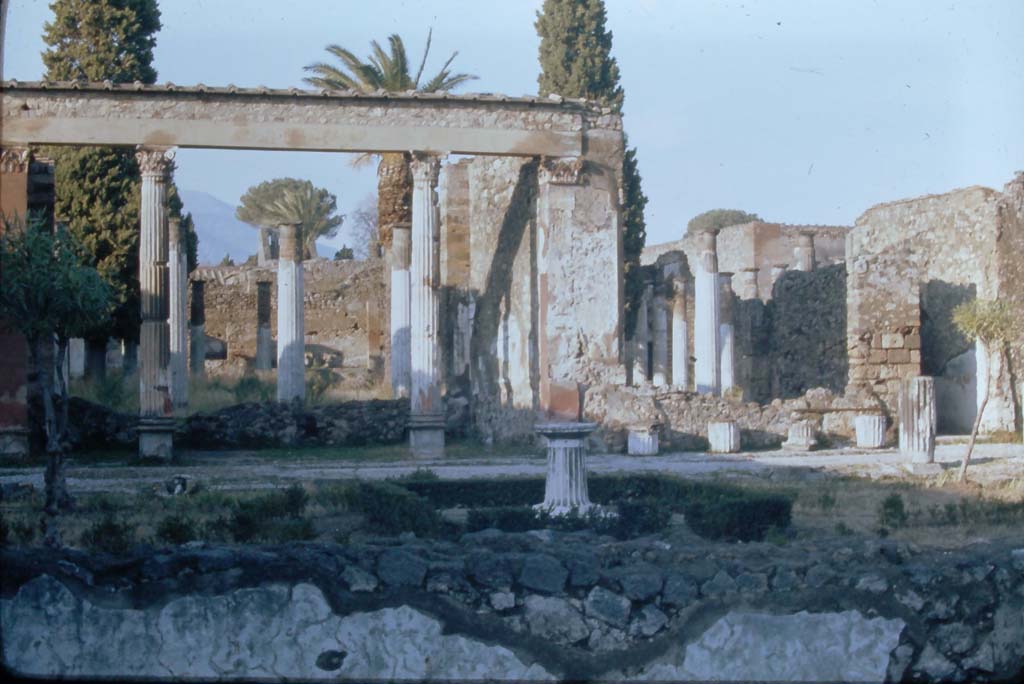 VI.12.2 Pompeii. 4th December 1971. Looking north from middle peristyle.
Photo courtesy of Rick Bauer, from Dr.George Fay’s slides collection.