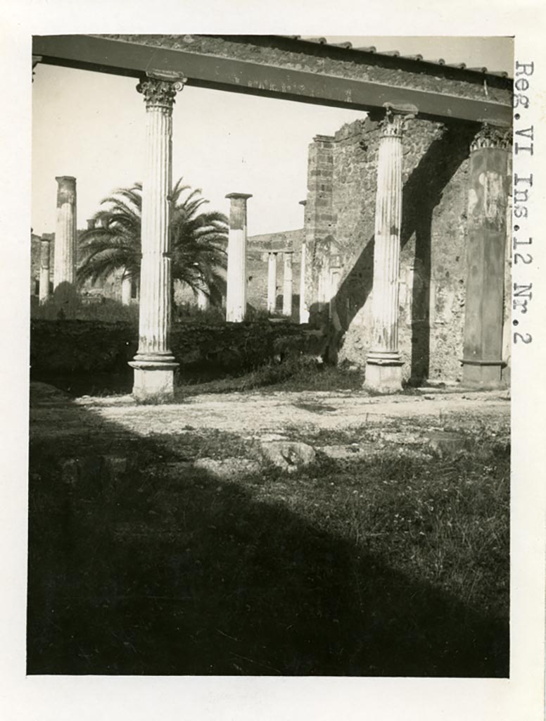 VI.12.2 Pompeii. Pre-1937-39. Looking north-east across first or middle peristyle, towards exedra.
Photo courtesy of American Academy in Rome, Photographic Archive. Warsher collection no. 1418.