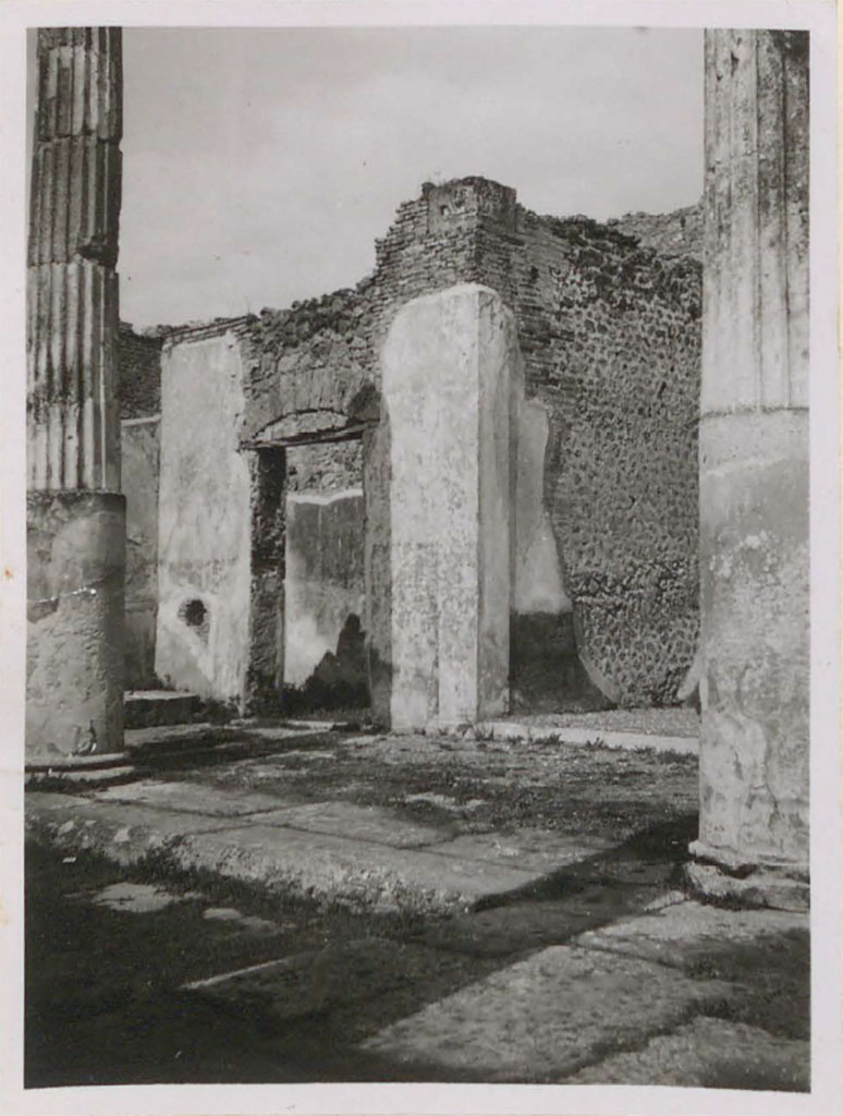 VI.12.5 Pompeii. Pre-1943.
Looking north-east across tetrastyle atrium 7 and impluvium towards a doorway to a triclinium 15, on north side of east ala 14.
See Warscher, T. (1946). Casa del Fauno, Swedish Institute, Rome. (p.56, n. 79).