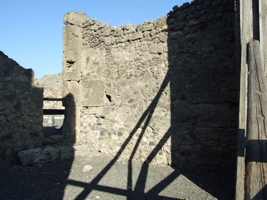 VI.13.1 Pompeii. December 2007. East wall of shop with doorway to the atrium of VI.13.2 in the north-east corner.