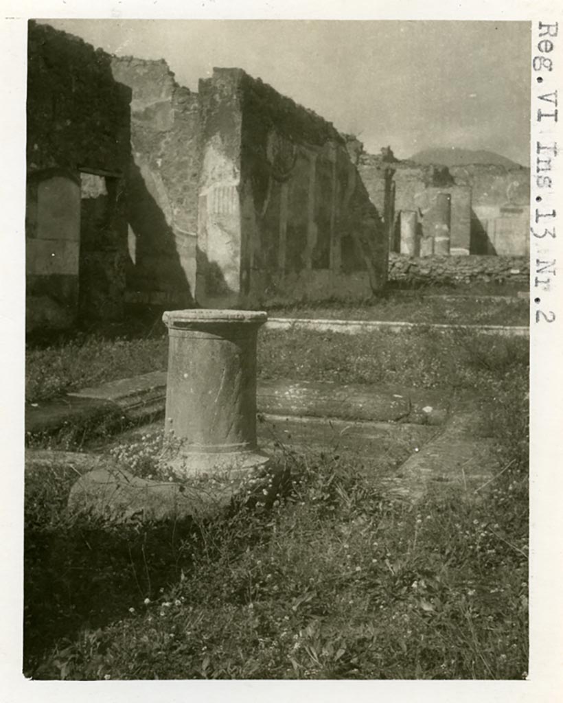 VI.13.2 Pompeii. Pre-1937-39.
Looking across impluvium in atrium towards the west wall of the tablinum, still with painted decoration.
Photo courtesy of American Academy in Rome, Photographic Archive. Warsher collection no. 1423.