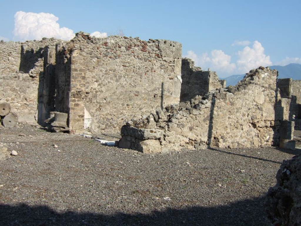 VI.13.2 Pompeii. September 2005. Looking south-east towards rear of andron, the east wall of tablinum and oecus, on the right.