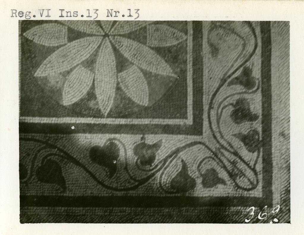 VI.13.13 Pompeii. Pre-1937-1939. Detail of floor mosaic in triclinium/oecus
In the centre was an “emblema” with rose ornament set into a garland with red, green and yellow polychrome tesserae.
Photo courtesy of American Academy in Rome, Photographic Archive. Warsher collection no. 369.
