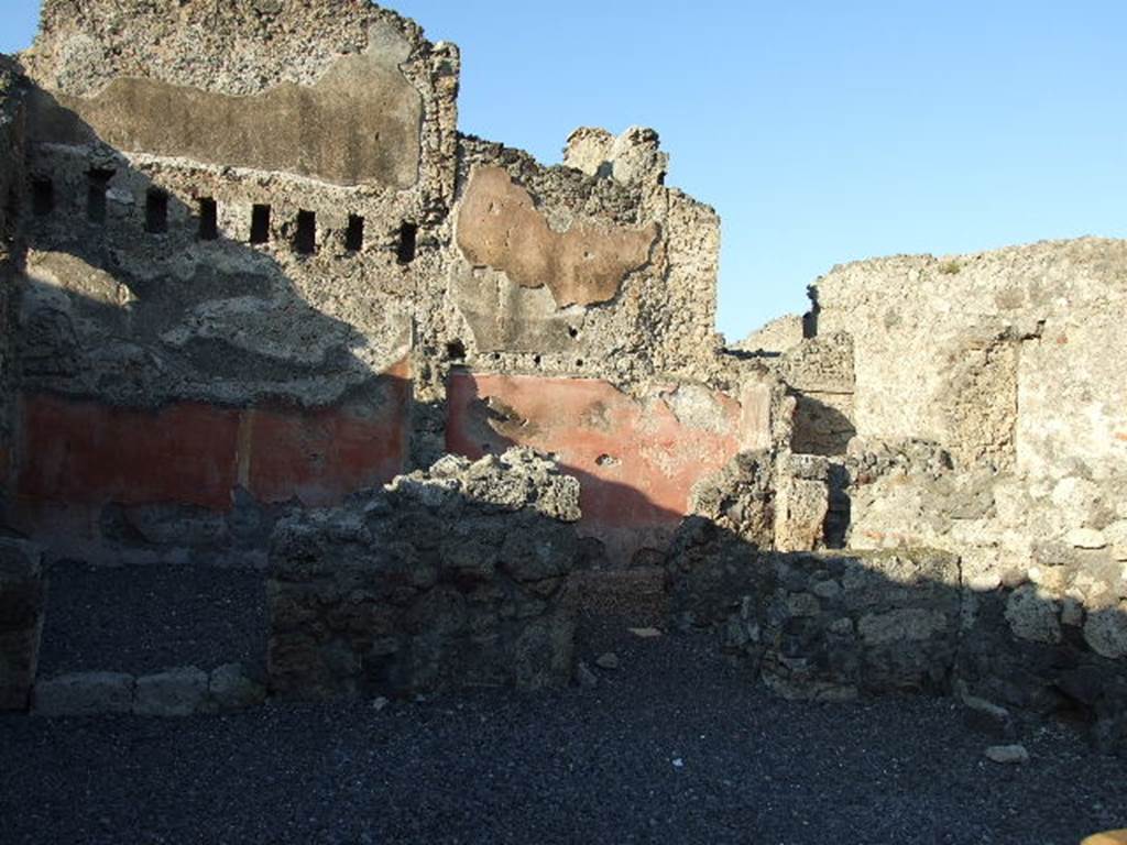 VI.14.8 Pompeii. December 2006. Doorway to small room on right side, with stairs to upper floor ? According to Helbig, visible in the second rear room on the left was an unclear painting. See Helbig, W., 1868. Wandgemälde der vom Vesuv verschütteten Städte Campaniens. Leipzig: Breitkopf und Härtel. (1387b). According to Fiorelli, the painting perhaps showed two litigants in the presence of a magistrate? See Pappalardo, U., 2001. La Descrizione di Pompei per Giuseppe Fiorelli (1875). Napoli: Massa Editore. (p.157). According to Eschebach, this may also have been known as the “Casetta dei Litiganti”, presumably named from the painting. See Eschebach, L., 1993. Gebäudeverzeichnis und Stadtplan der antiken Stadt Pompeji. Köln: Böhlau. (p.209)