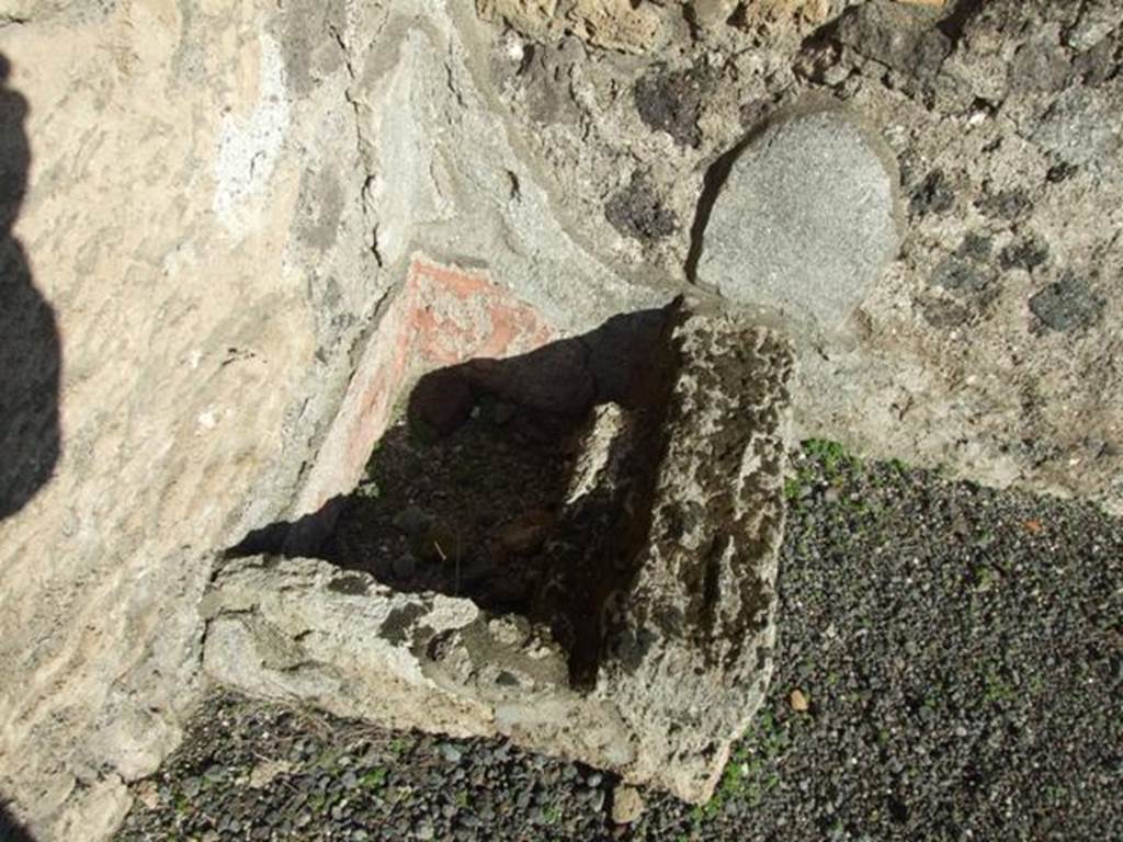 VI.14.13 Pompeii. December 2007. Stone structure in north-east corner, possibly for amphorae