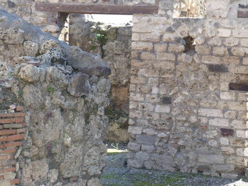 VI.14.18 Pompeii. March 2009. Room on south side, and corridor leading to VI.14.18. Taken from atrium of VI.14.20.