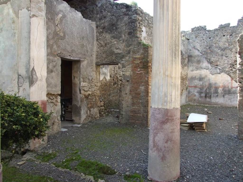 VI.14.20 Pompeii. March 2009. Room 16. Portico area on west side, with doors to rooms 13, 14, and 15.