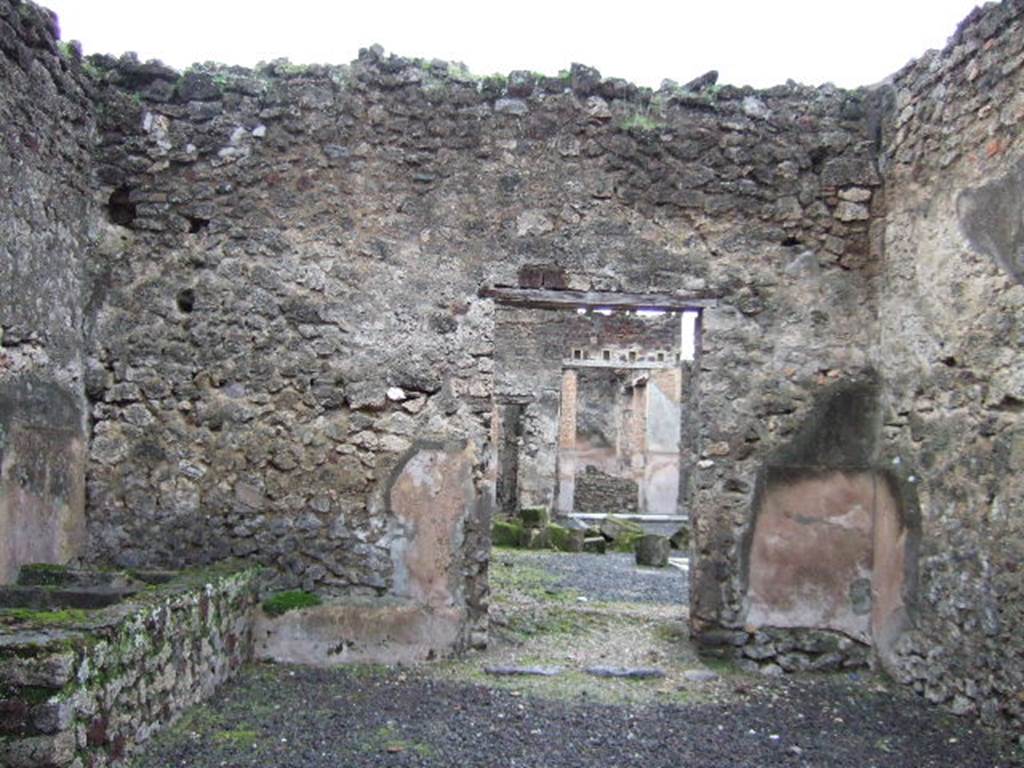 VI.14.21 Pompeii. December 2005. Looking west through doorway to Fullonica at VI.14.22.