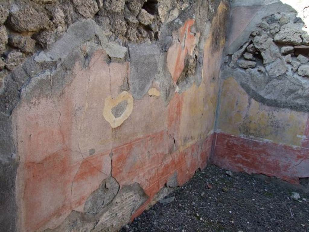 VI.14.22 Pompeii. December 2007. Room 15, west wall of triclinium. According to BdI, on this wall (the entrance wall) the following paintings were seen upon excavation. Painting (1.12 high x 1.12 wide) showing a figure with a feminine aspect (0.80 high) (Hermaphrodite or Venus) looking at him/herself in a mirror. The background was filled with a simple and white building, at the top of the wall was a cornice. On the extreme left was a cupid standing on a pedestal with an open box, next to the feminine figure was a herm, statuette or person (due to the bad state of the painting it was difficult to see). On the right of the painting was a seated figure of Jove. On the same wall, more to the right was a medallion (0.40 diam.) badly preserved of a female head, turning a little to the left. See BdI, 1876, (p.25-6).
See Schefold, K., 1962. Vergessenes Pompeji. Bern: Francke. (p.77, 171, and photo 168, 4)
See Sogliano, A., 1879. Le pitture murali campane scoverte negli anni 1867-79. Napoli: Giannini. (p.20, no.74)